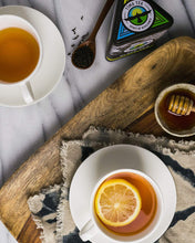 Load image into Gallery viewer, Tima Tea Organic Fair Trade Loose Leaf Black Rwandan Tea 2 oz.
